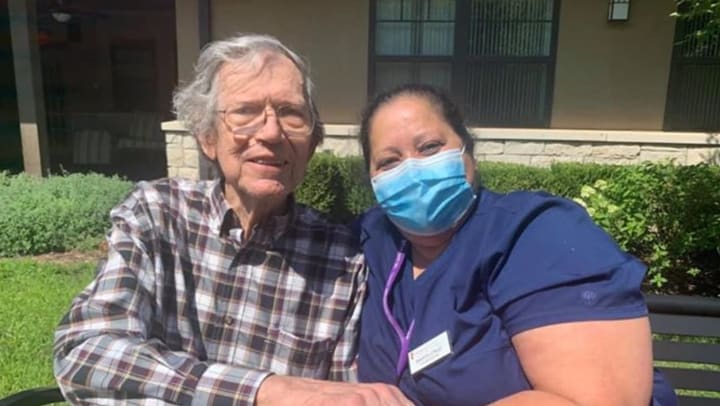 Chisholm Place caregiver with resident memory care
