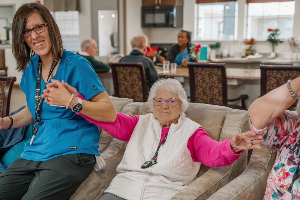 Our resident with our staff at Highline Place in Littleton, Colorado