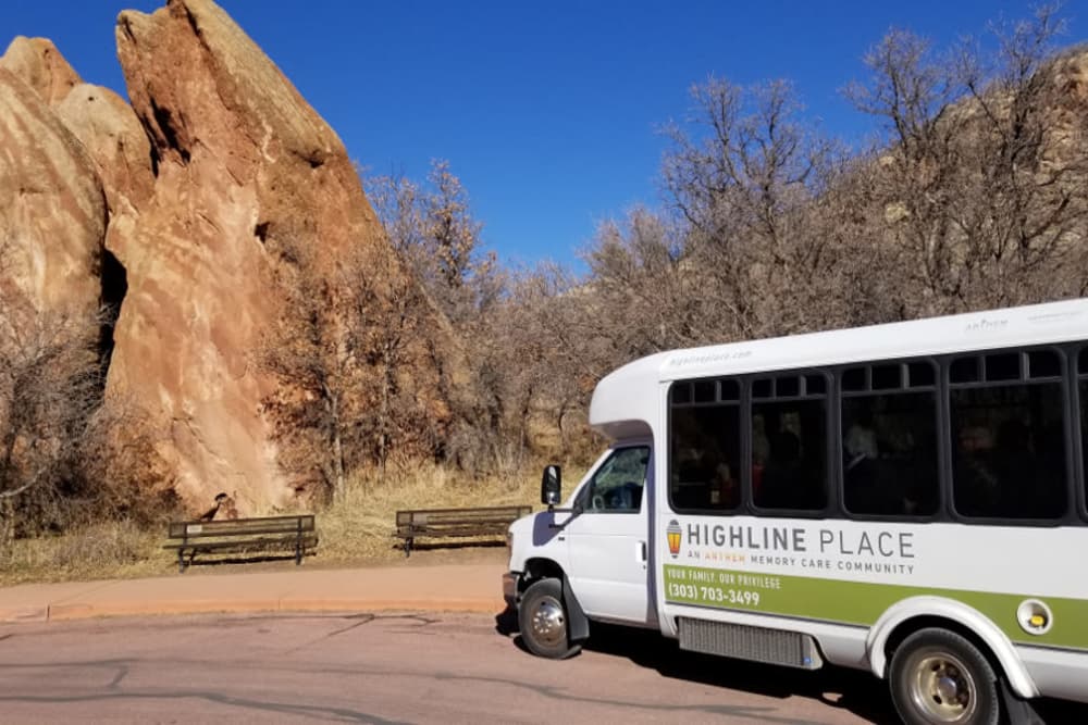 Happy residents playing cards at our senior living facility in Littleton