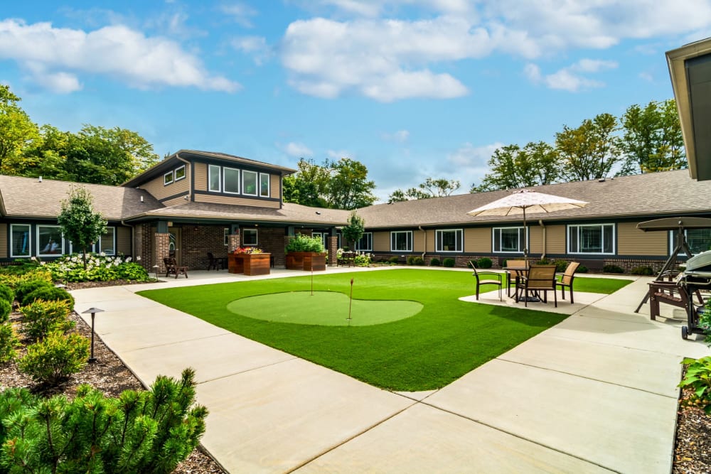 large green courtyard with walking path