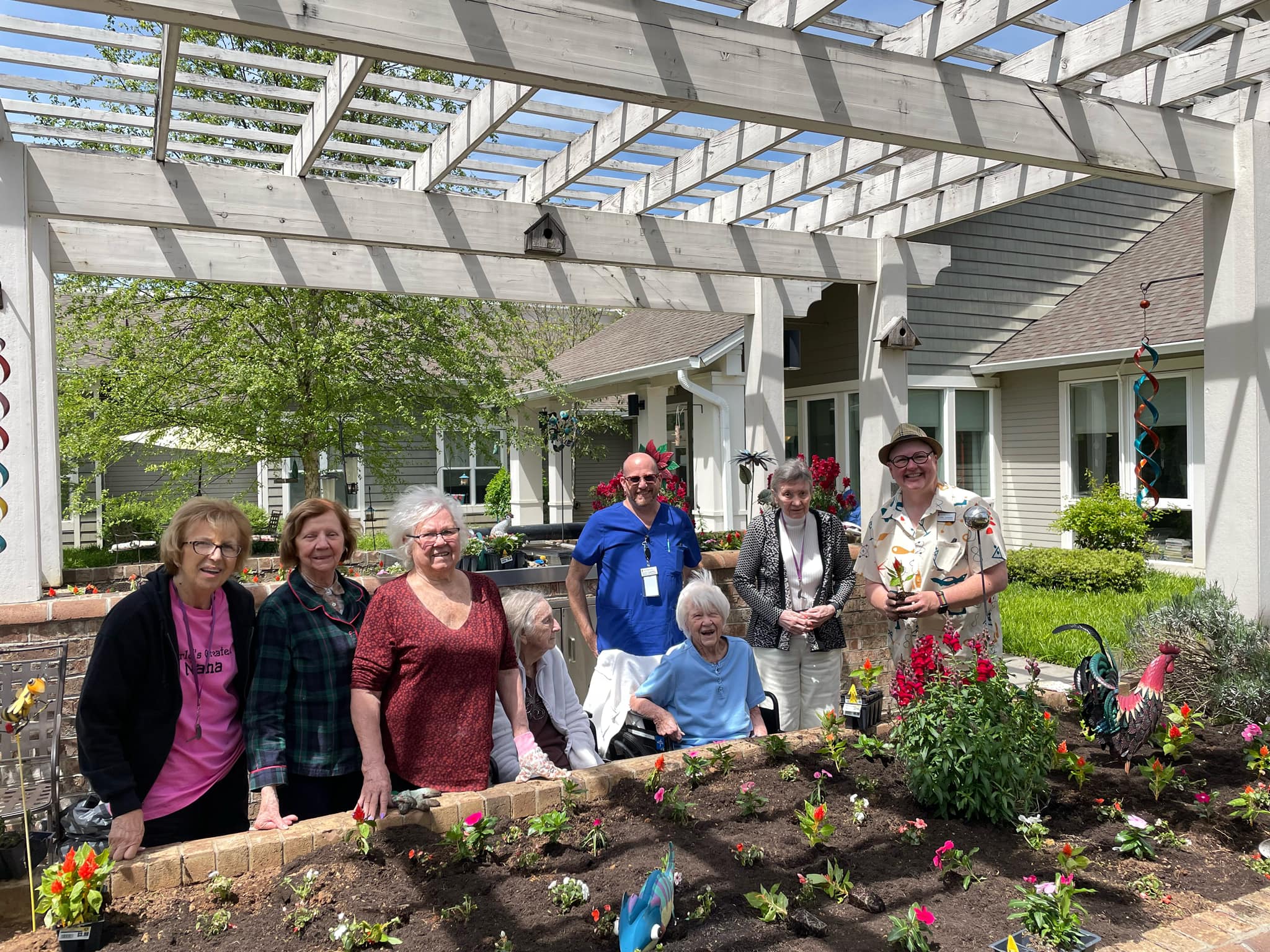 Residents outside gardening