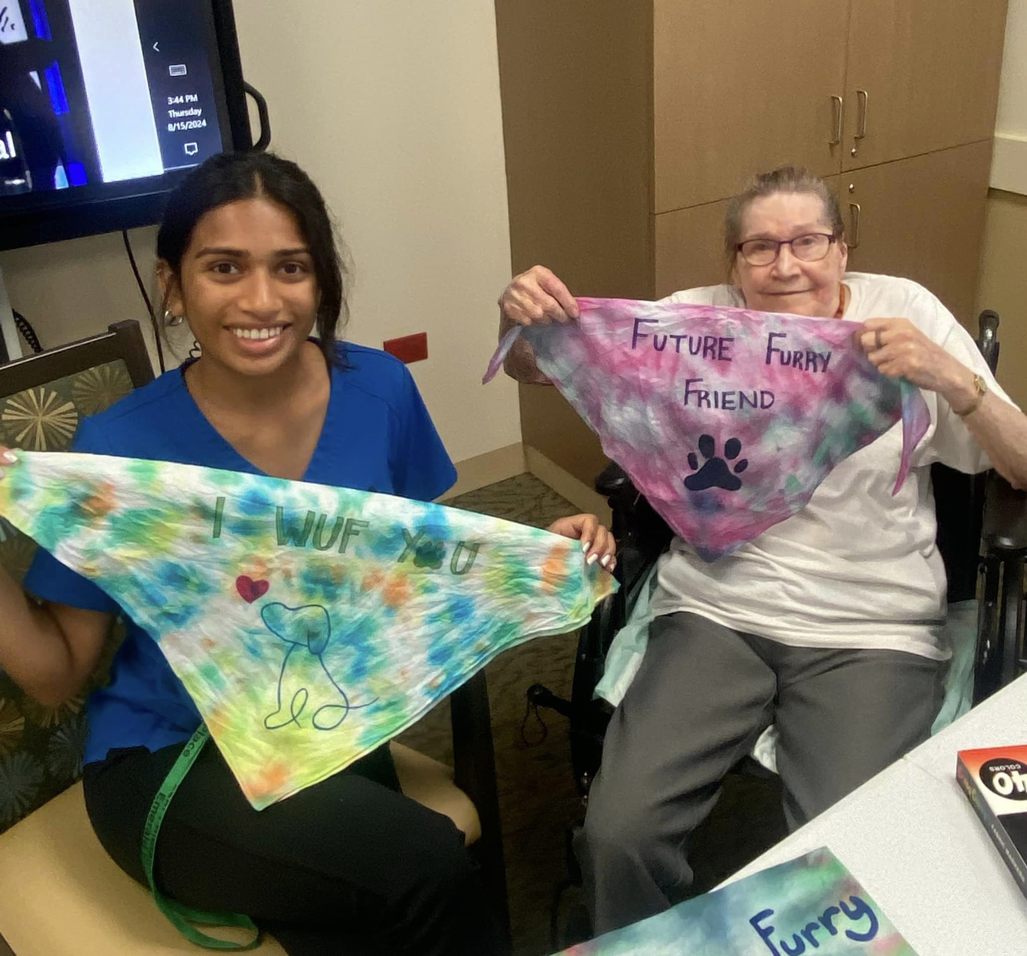 Emerald Place residents designing bandanas for shelter dogs