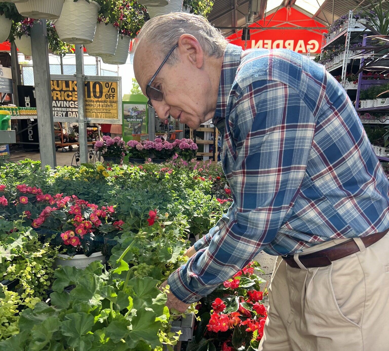 resident buying flowers at Home Depot
