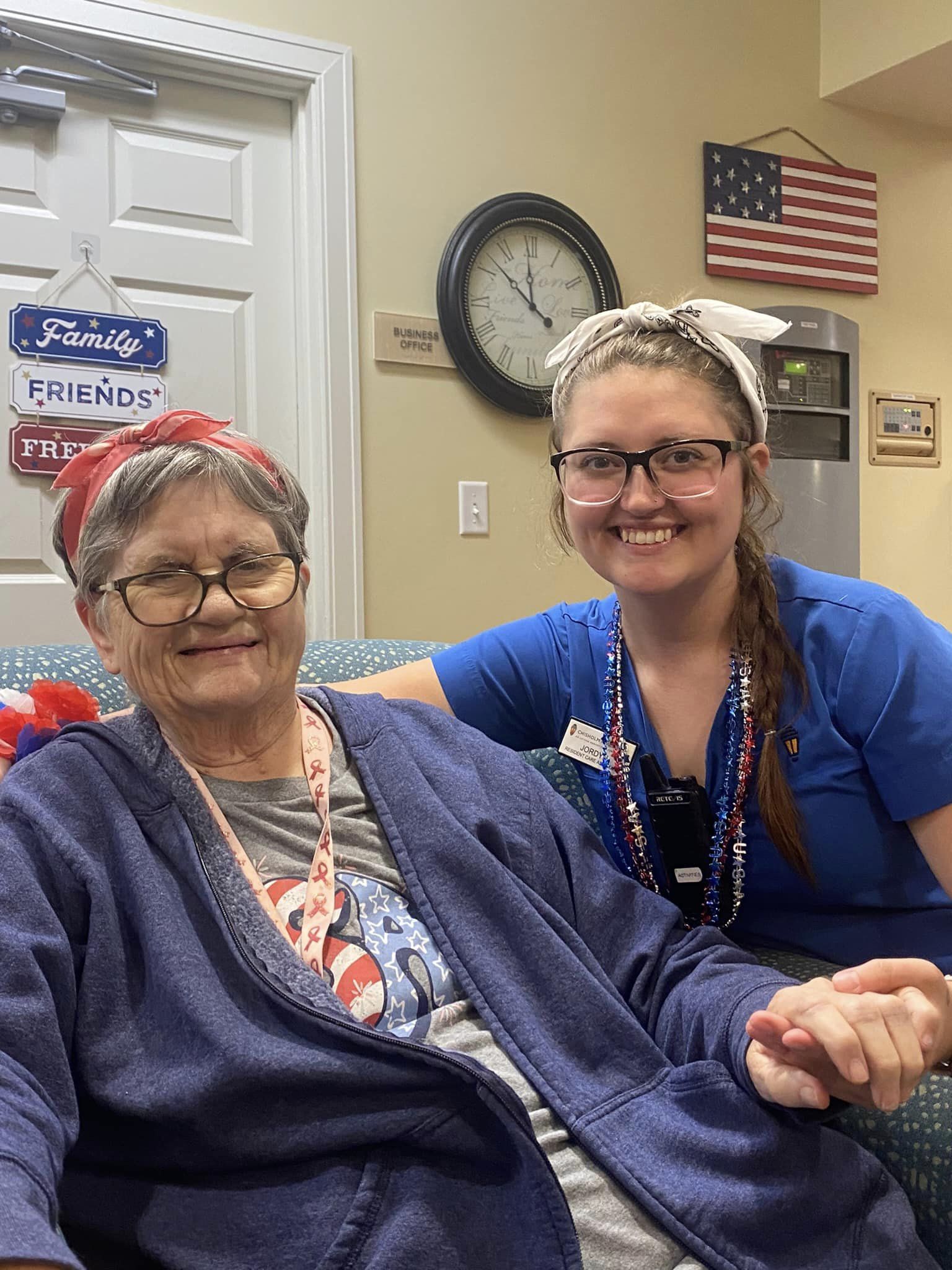 Resident and staff member at Chisholm Place Smiling